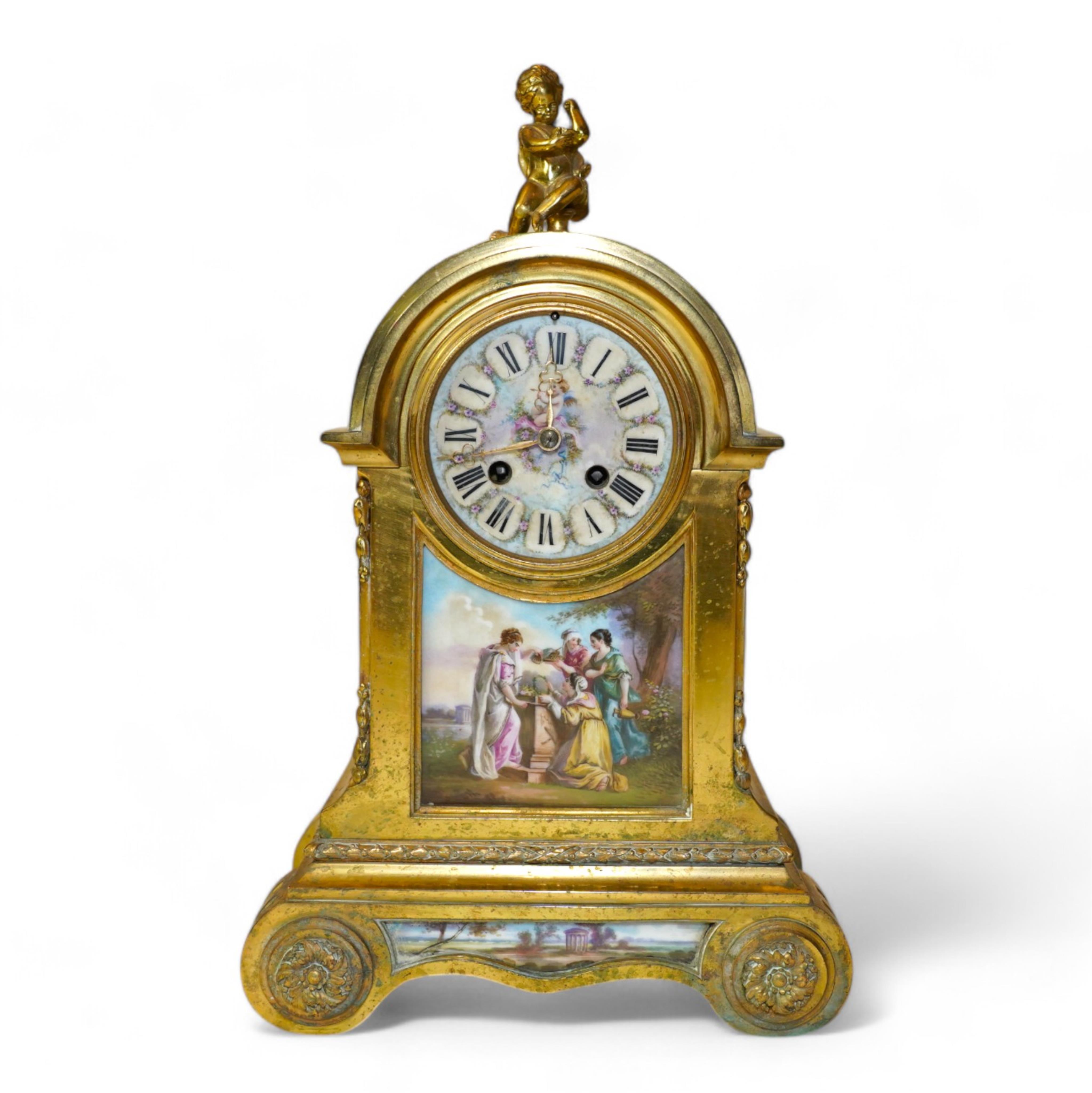 A Louis XVl style gilt brass cased eight day mantel clock